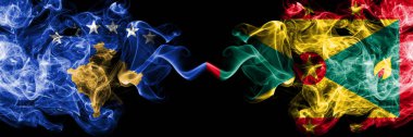 Kosova vs Grenada dumanlı mistik bayraklar yan yana yerleştirilir. Kalın renkli ipeksi Sigara Kosova ve Grenada bayrağı kombinasyonu