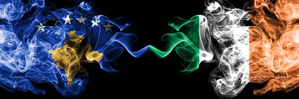 Kosovo vs Ireland, Irish smoky mystic flags placed side by side. Thick colored silky smokes combination of Kosovo and Ireland, Irish flag — Stock Photo, Image