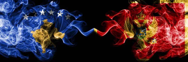 Kosovo vs Montenegro, banderas místicas ahumadas de Montenegro colocadas una al lado de la otra. Combinación de humo sedoso de color grueso de Kosovo y Montenegro, bandera montenegrina — Foto de Stock
