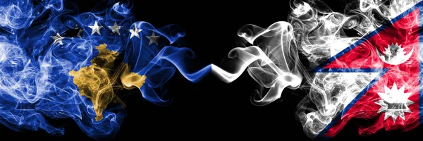 Kosovo vs Nepal, Nepalese smoky mystic flags placed side by side. Thick colored silky smokes combination of Kosovo and Nepal, Nepalese flag — Stock Photo, Image