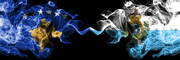 Kosovo vs San Marino, Sammarinese smoky mystic flags placed side by side. Thick colored silky smokes combination of Kosovo and San Marino, Sammarinese flag — Stock Photo, Image