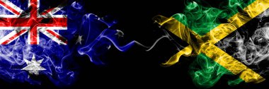 Avustralya vs Jamaika, Jamaikalı dumanlı mistik bayraklar yan yana yerleştirilir. Avustralya ve Jamaika, Jamaika ulusal bayrakları kalın renkli ipeksi dumanlar kombinasyonu