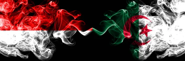 Індонезія проти Алжиру, Алжирські димчастого містичних прапорів розташованих пліч-на-пліч. Товсті кольорові, шовковисте дим прапори Індонезії та Алжиру, Алжирські — стокове фото