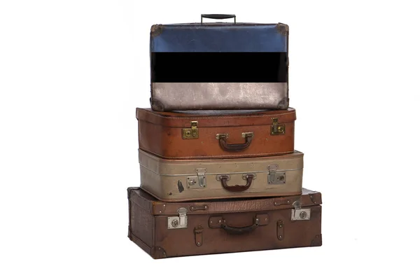 Estonia, concetto di viaggio estone. Gruppo di valigie vintage isolate su sfondo bianco . — Foto Stock