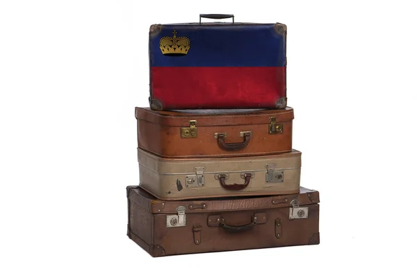 Liechtenstein: concetto di viaggio per i viaggiatori. Gruppo di valigie vintage isolate su sfondo bianco . — Foto Stock
