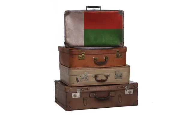Madagascar, concepto de viaje de Madagascar. Grupo de maletas vintage aisladas sobre fondo blanco . — Foto de Stock