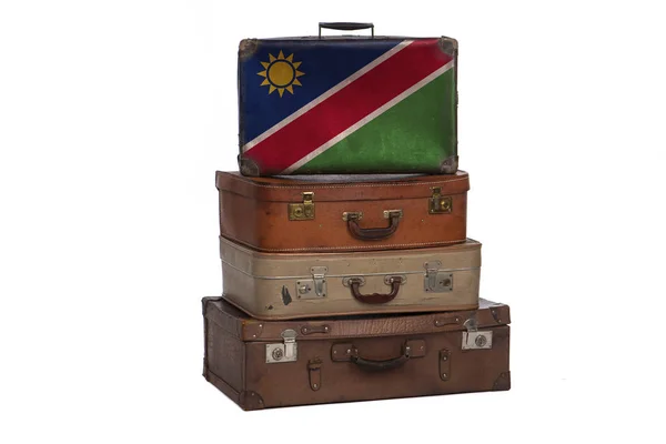 Namibia, concetto di viaggio namibiano. Gruppo di valigie vintage isolate su sfondo bianco . — Foto Stock