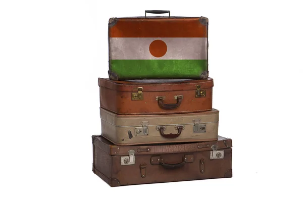 Niger, Nigerian travel concept. Group of vintage suitcases isolated on white background. — Stock Photo, Image