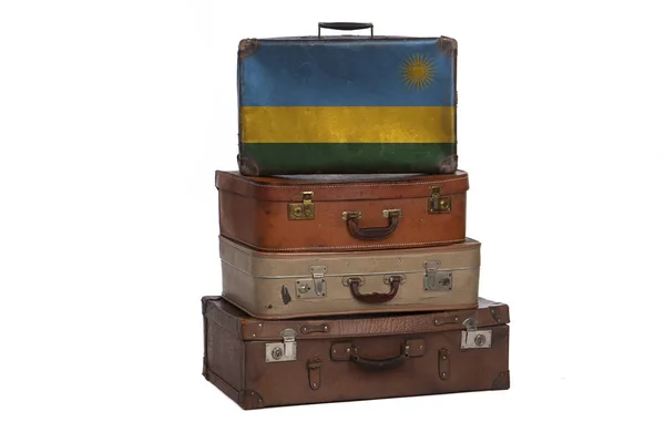 Руанда, руандийская концепция путешествий. Группа винтажных чемоданов на белом фоне . — стоковое фото