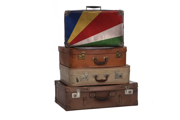Seychelles, concepto de viaje de Seychelles. Grupo de maletas vintage aisladas sobre fondo blanco . — Foto de Stock