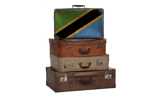 Tanzania, concetto di viaggio in Tanzania. Gruppo di valigie vintage isolate su sfondo bianco . — Foto Stock