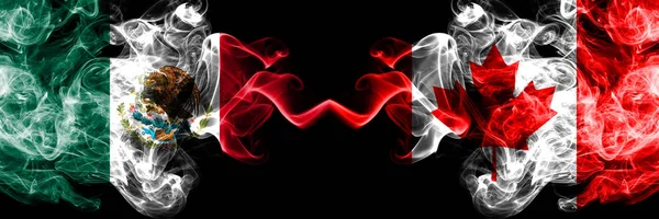 Meksika vs Kanada, Kanada dumanlı mistik bayraklar yan yana yerleştirilir. Kalın renkli ipeksi soyut Meksika ve Kanada, Kanada afiş dumanlar