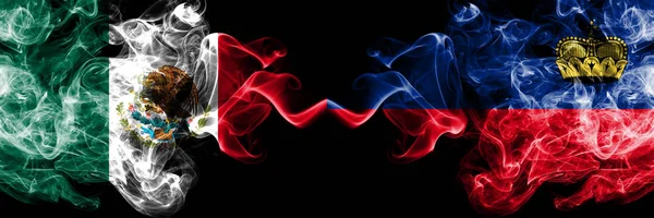 Meksika vs Liechtenstein, Liechtenstein dumanlı mistik bayraklar yan yana yerleştirilir. Kalın renkli ipeksi soyut Meksika ve Lihtenştayn, Liechtenstein afiş dumanlar