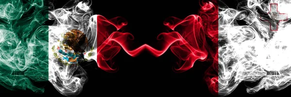 Meksika vs Malta, Malta dumanlı mistik bayraklar yan yana yerleştirilir. Kalın renkli ipeksi soyut Meksika ve Malta, Malta afiş dumanlar