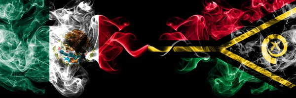 Mexico vs Vanuatu smoky mystic flags placed side by side. Thick colored silky abstract smokes banner of Mexican and Vanuatu — Stock Photo, Image