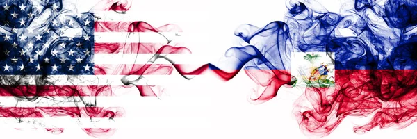 United States of America vs Haiti, Haitian smoky mystic flags placed side by side. Thick colored silky abstract smokes banner of America and Haiti, Haitian — Stock Photo, Image