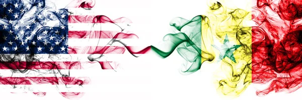 United States of America vs Senegal, Senegalese smoky mystic flags placed side by side. Thick colored silky abstract smokes banner of America and Senegal, Senegalese — 스톡 사진