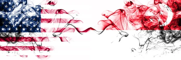United States of America vs Singapore, Singaporean smoky mystic flags placed side by side. Thick colored silky abstract smokes banner of America and Singapore, Singaporean — Stock Photo, Image