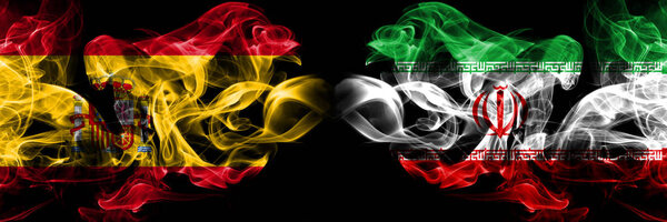 Spain, Spanish, Iran, Iranian smoky mystical flags placed side by side. Thick colored silky smokes flag concept