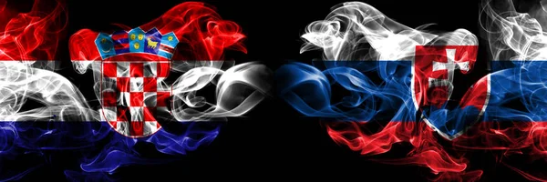 Kroatien, kroatiska, Slovakien, slovakiska, flip konkurrens tjocka färgglada rökiga flaggor. Europeiska fotbolls kvalifikationer spel — Stockfoto