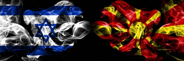 Ισραήλ, Ισραήλ, πΓΔΜ, Μακεδονικό ανταγωνισμό πυκνά πολύχρωμα καπνισμένα σημαίες. Ευρωπαϊκά παιχνίδια προσόντων ποδοσφαίρου — Φωτογραφία Αρχείου