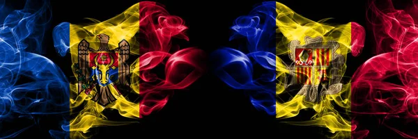 Μολδαβία, μολδαβική, Ανδόρα, ο ανταγωνισμός της Ανδόρας πυκνά πολύχρωμα καπνισμένα σημαίες. Ευρωπαϊκά παιχνίδια προσόντων ποδοσφαίρου — Φωτογραφία Αρχείου