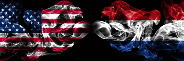 Сполучені Штати Америки, США проти Нідерландів, Голландська фон абстрактна концепція світу курить прапори. — стокове фото