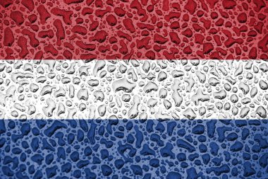 Hollanda ulusal bayrağı su damlalarından yapılmış. Arka plan tahmini sezon konsepti.