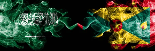 Саудівська Аравія Королівство проти Гренада димчастий містичних прапорів, розташованих пліч-на-пліч. Товсті кольорові, шовковисте дим прапори арабської, арабської та Гренади — стокове фото
