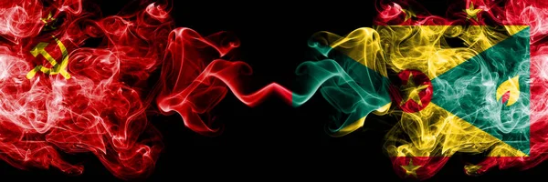 Communist vs Grenada abstract smoky mystic flags placed side by side. Thick colored silky smoke flags of Communism and Grenada — Stock Photo, Image