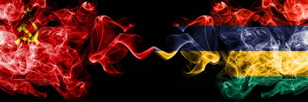 Communist vs Mauritius, Mauritian abstract smoky mystic flags placed side by side. Thick colored silky smoke flags of Communism and Mauritius, Mauritian — Stock Photo, Image