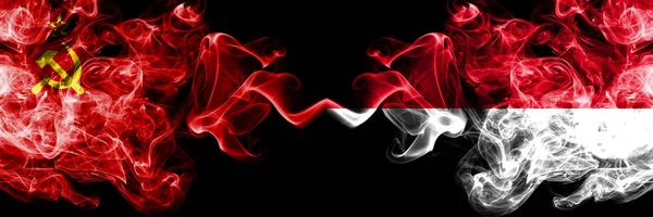 Communist vs Monaco, Monacan abstract smoky mystic flags placed side by side. Thick colored silky smoke flags of Communism and Monaco, Monacan — Stock Photo, Image