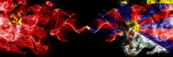 Communist vs Tibet, Tibetan abstract smoky mystic flags placed side by side. Thick colored silky smoke flags of Communism and Tibet, Tibetan — Stock Photo, Image