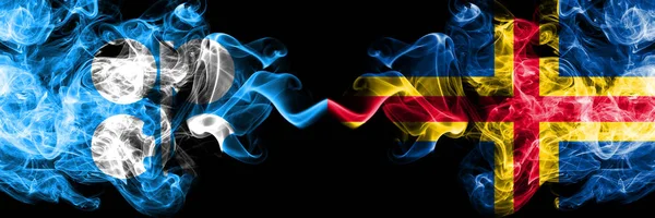 Opec vs Aland bandeiras místicas fumegantes abstratas colocadas lado a lado. Bandeiras de fumaça sedosa de cor grossa de Opec e Aland — Fotografia de Stock