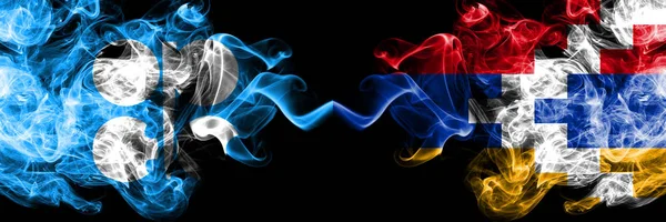 Opec vs Artsakh abstract smoky mystic flags placed side by side. Thick colored silky smoke flags of Opec and Artsakh — Stock Photo, Image