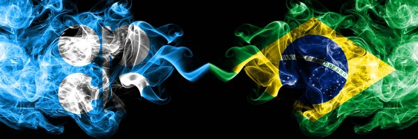Opec vs Βραζιλία, Βραζιλίας αφηρημένη καπνιστή μυστικιστική σημαίες τοποθετούνται δίπλα-δίπλα. Χοντρές χρωματιστές μεταξένιες σημαίες καπνού του Opec και της Βραζιλίας, Βραζιλίας — Φωτογραφία Αρχείου