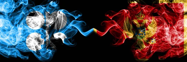 Opec vs Montenegro, Montenegrin abstract smoky mystic flags placed side by side. Thick colored silky smoke flags of Opec and Montenegro, Montenegrin — Stock Photo, Image