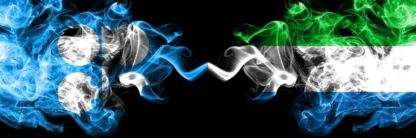 Opec vs Sierra Leone abstract smoky mystic flags placed side by side. Thick colored silky smoke flags of Opec and Sierra Leone — Stock Photo, Image