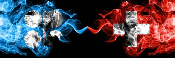 Opec vs Switzerland, Swiss abstract smoky mystic flags placed side by side. Thick colored silky smoke flags of Opec and Switzerland, Swiss — Stock Photo, Image