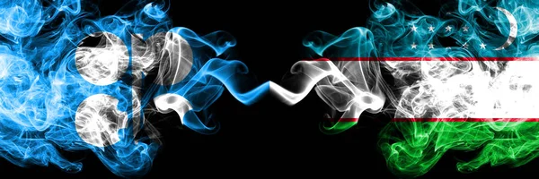 Opec vs Uzbekistan, Uzbek abstract smoky mystic flags placed side by side. Thick colored silky smoke flags of Opec and Uzbekistan, Uzbek — Stock Photo, Image