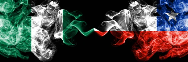 Nigeria vs Chile, Chilean abstract smoky mystic flags placed side by side. Thick colored silky smoke flags of Nigerian and Chile, Chilean — Stock Photo, Image