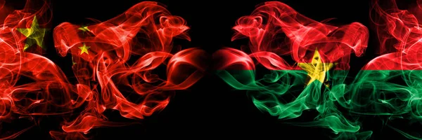 China vs Burkina Faso smoke flags placed side by side. Thick colored silky smoke flags of Chinese and Burkina Faso — Stock Photo, Image