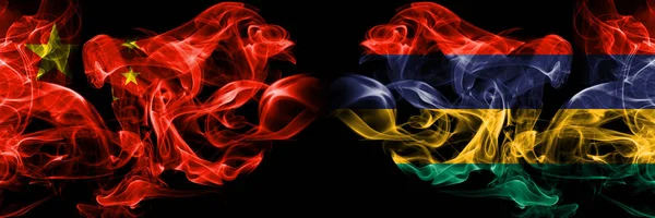 China vs Mauritius, Mauritian smoke flags placed side by side. Thick colored silky smoke flags of Chinese and Mauritius, Mauritian — Stock Photo, Image