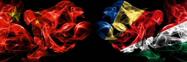 China vs Seychelles, Seychelloise smoke flags placed side by side. Thick colored silky smoke flags of Chinese and Seychelles, Seychelloise — Stock Photo, Image