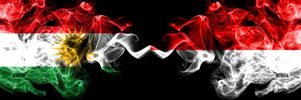 Курдистан - Индонезия, индонезийские дымовые флаги, размещенные бок о бок — стоковое фото