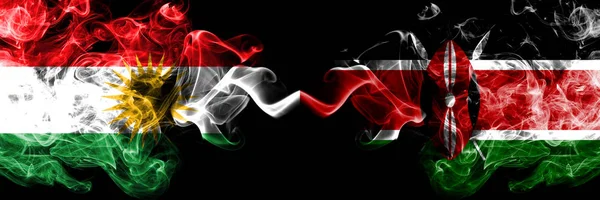 Kurdistan vs Kenya, Kenyan smoke flags placed side by side. Thic — Stock Photo, Image