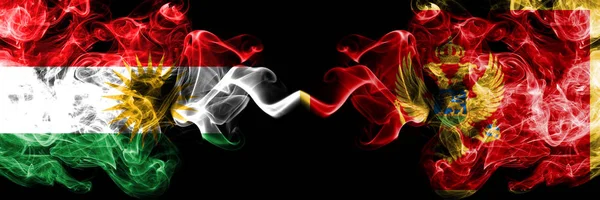 Kurdistan vs Montenegro, Montenegrin smoke flags placed side by — Stock Photo, Image