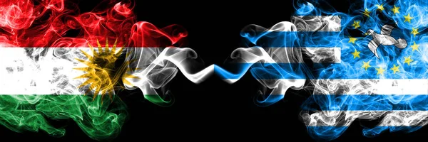 Kurdistan vs South Cameroon smoke flags placed side by side. Thi — Stock Photo, Image