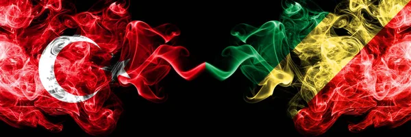 Turkey vs Congo, Congolese smoke flags placed side by side. Thick colored silky smoke flags of Turkish and Congo, Congolese — Stock Photo, Image