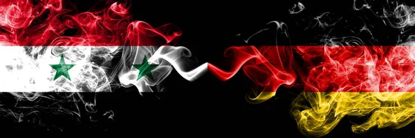 Syria vs Germany, German smoke flags placed side by side. Thick colored silky smoke flags of Syrian and Germany, German — Stock Photo, Image